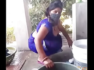 Geeta Bhabhi washing clothes with boobs open